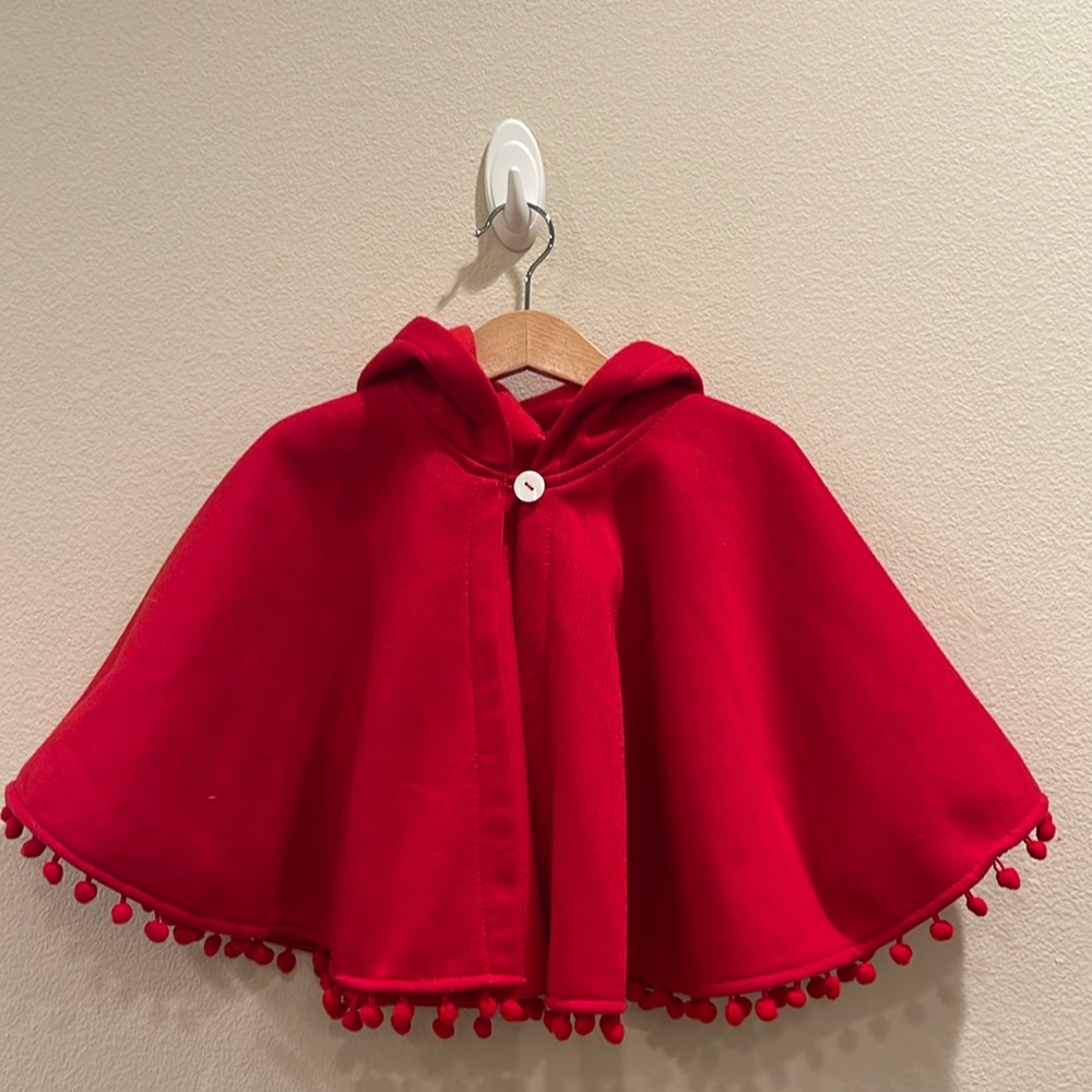 Girls hooded red cape with tassels